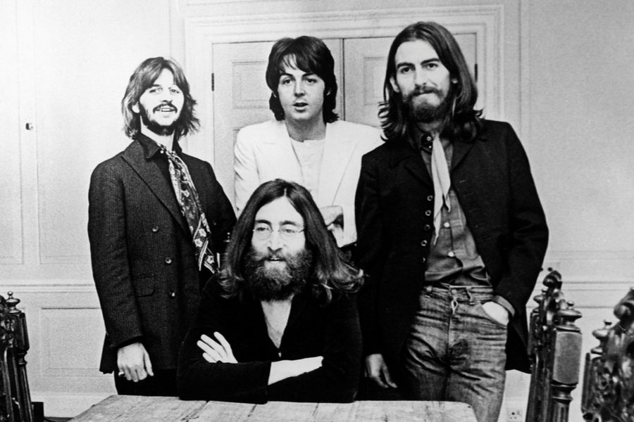 Which Beatles album includes the song “Come Together”?