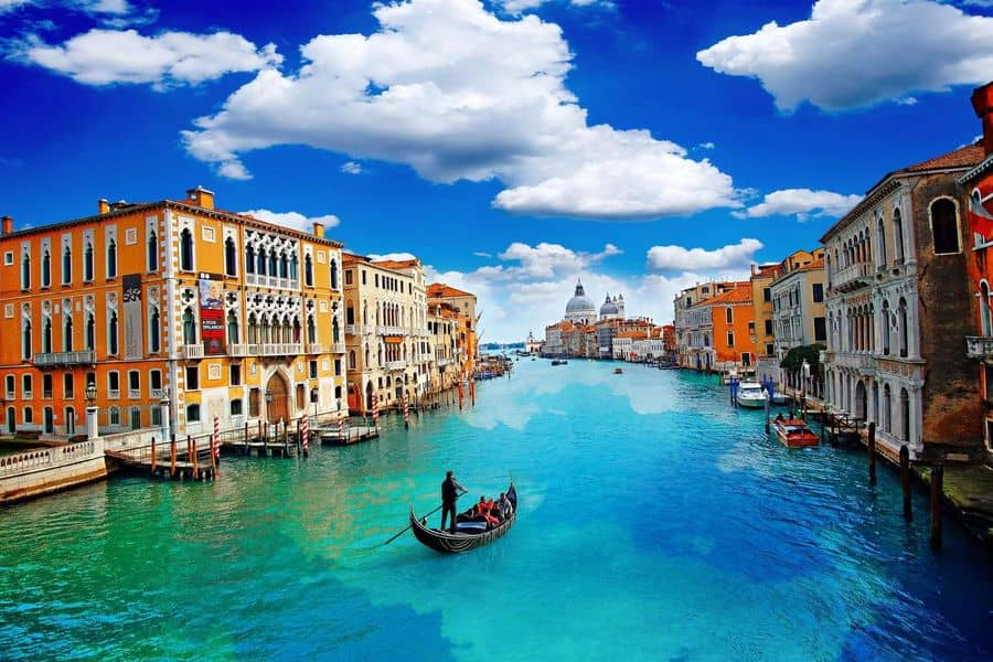 The Republic of Venice became wealthy primarily through what?